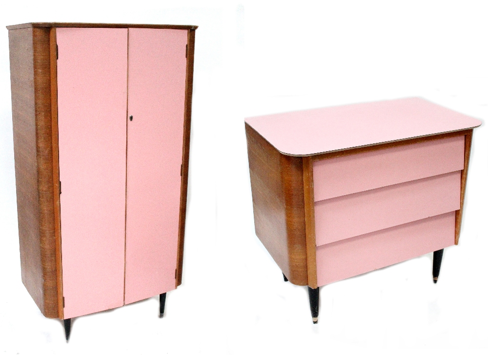 A mid-20th century retro pink Formica and veneer wood part bedroom suite comprising a wardrobe,