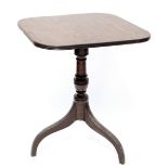 A Victorian mahogany square tilt-topped occasional table to turned central column and three