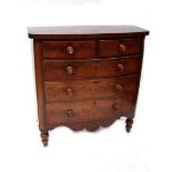 A Victorian mahogany bow-fronted chest of two short and three long graduated drawers with shaped