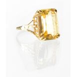 A 9ct gold fashion ring set with large rectangular cut citrine, size O, approx 4.36g.