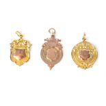 Three 9ct gold watch fobs/prize fobs to include one with the inscription to the reverse 'L.M.S.A.