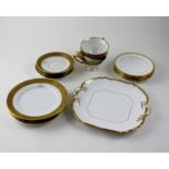 A Czechoslovakian white and gilt-heightened twelve-piece tea service to include cups, saucers,
