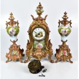 A late 19th century French bronzed metal and overpainted transfer decorated porcelain mantel clock