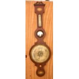 An Edwardian mahogany and marquetry banjo thermometer and barometer with silvered dial, unsigned,