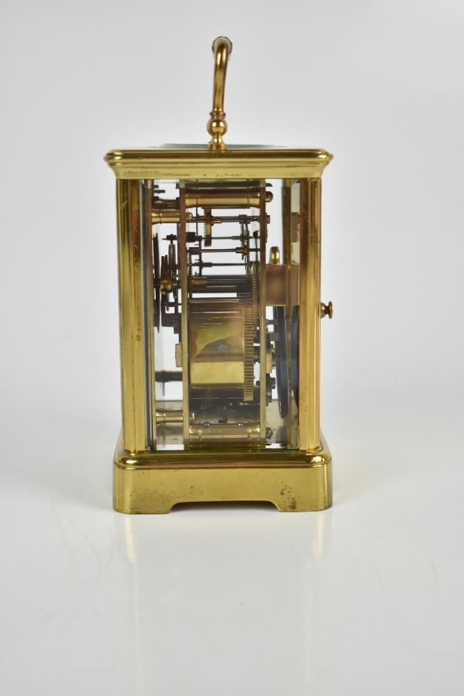 A late 19th century French brass carriage clock, the white enamel dial set with Roman numerals - Image 3 of 6