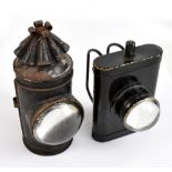 Two early/mid-20th century hand held lights, one oil and the other battery powered, height of