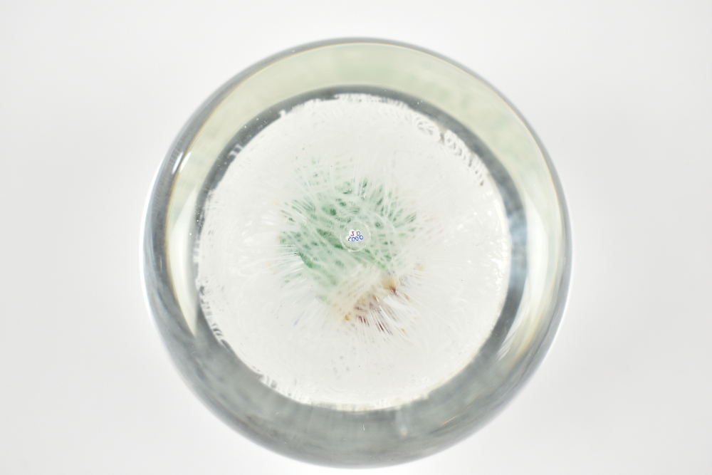 JOHN DEACONS; two glass paperweights, one encased on a latticino bed, with millefiori scattered - Image 4 of 4