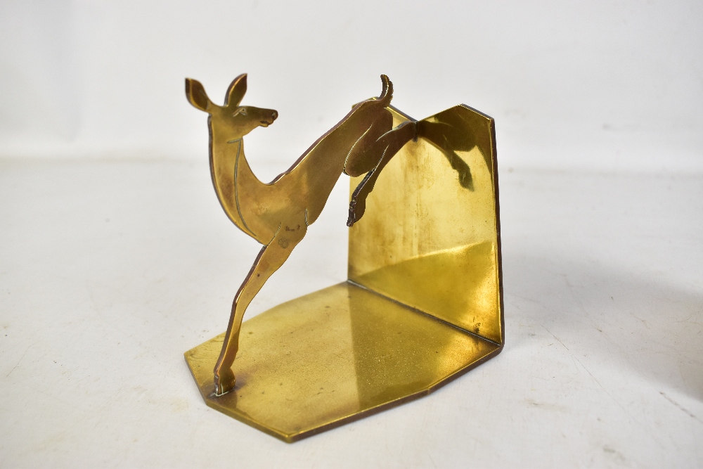 A pair of Art Deco brass bookends modelled as leaping deer, height 12cm.Additional InformationOne is - Image 3 of 4