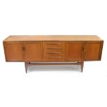 V.B. WILKINS FOR G-PLAN; a Fresco teak 'Long John' sideboard with four central drawers flanked on