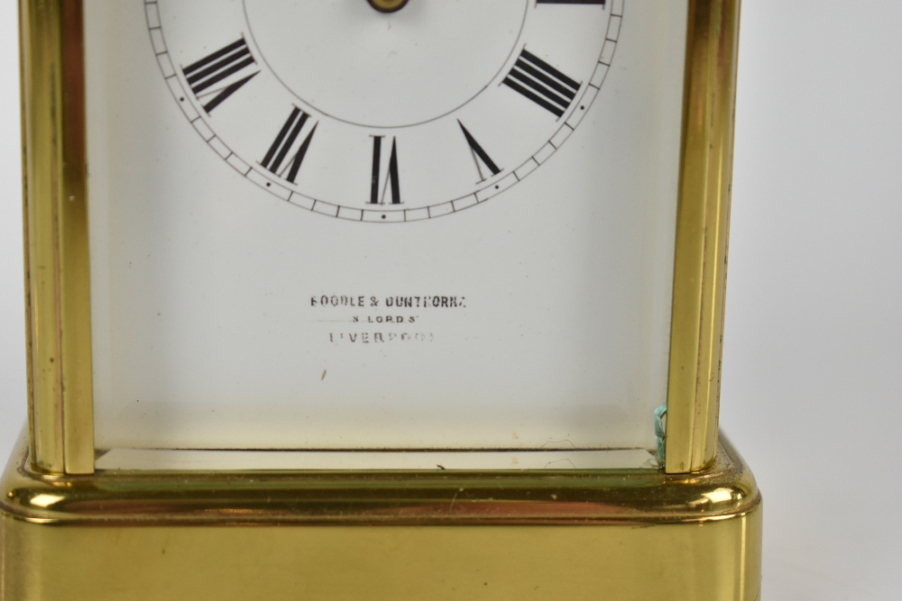 A late 19th century French brass carriage clock, the white enamel dial set with Roman numerals - Image 2 of 6