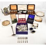 A quantity of silver plate including flatware, hot water pot, pair of oval salts, etc.