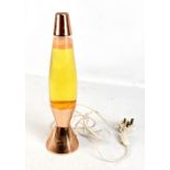 An original early 1970s lava lamp with copper coloured finished, height 40.5cm. Please note this