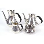 COHR OF DENMARK; a four piece silver plated tea service with ebonised handles, height of water pot