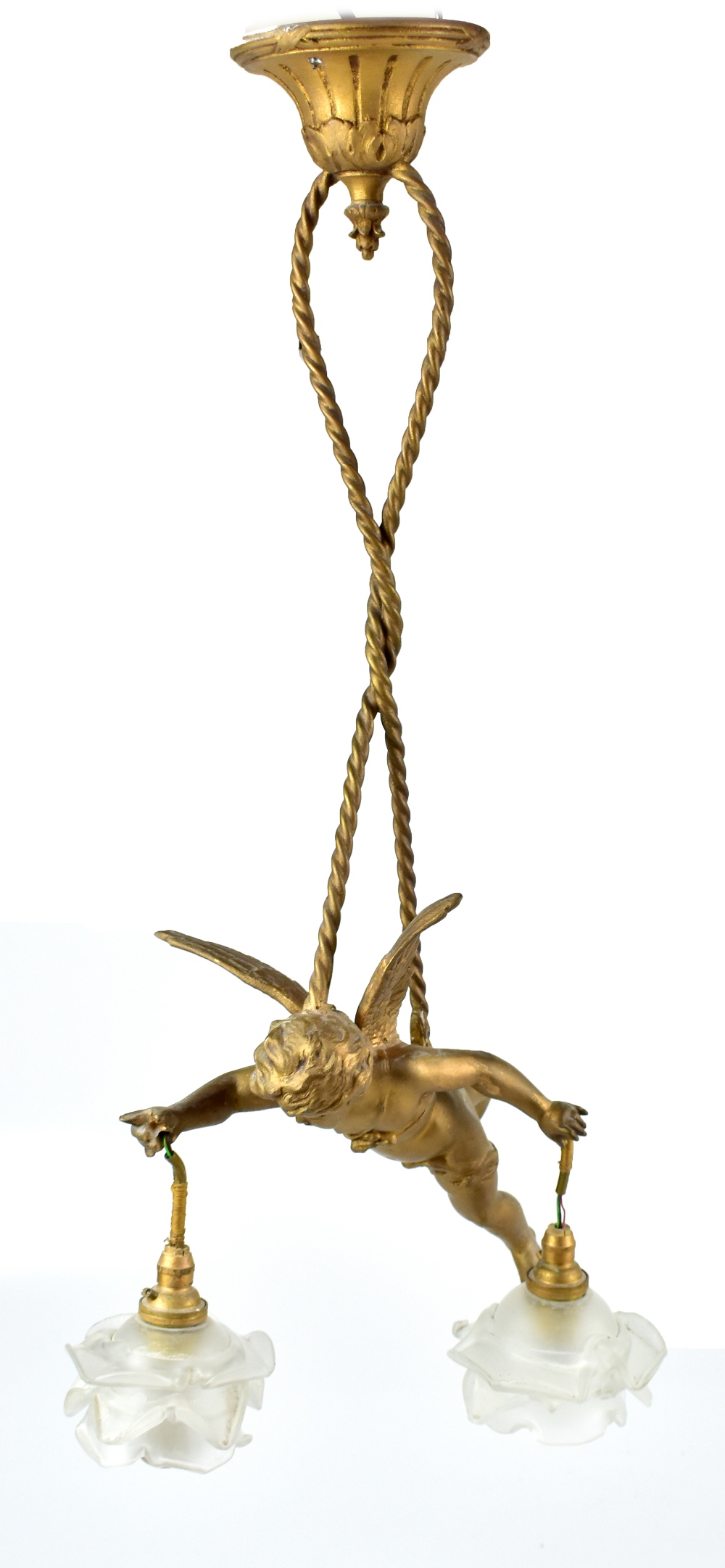 A gilt metal ceiling light modelled as Eros suspended by ropes carrying opaque floral moulded