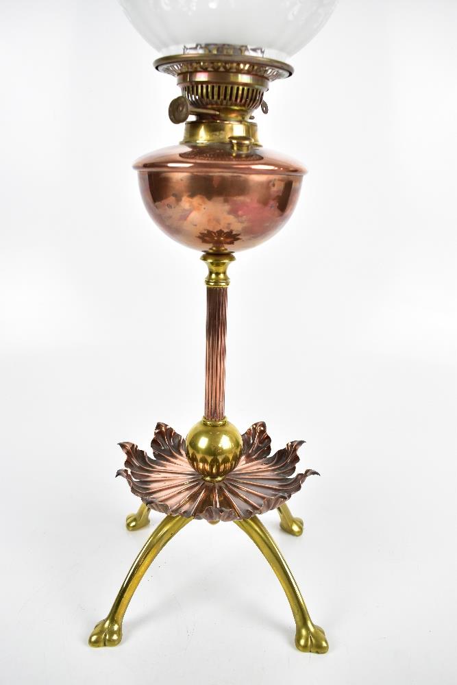 WILLIAM ARTHUR SMITH BENSON (1854-1924); an Arts & Crafts copper and brass oil lamp raised on single - Image 3 of 8