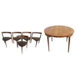 HANS OLSEN (1919-1992) FOR FREM ROJLE; a Danish teak dining suite comprising circular extending