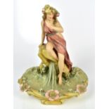 ROYAL DUX; an Art Nouveau figural bowl featuring a maiden beside floral encrusted decoration,