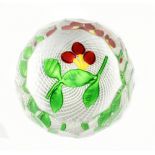 ST LOUIS; a contemporary glass paperweight encased with fruit and flowers on a latticino base with