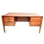 WILHELM RENZ; a mid-20th century Scandinavian teak partner's desk, the front with three drawers