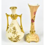 ROYAL WORCESTER; a blush ivory twin handled vase of tapering form with gilt floral decoration,