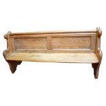 A pitch pine pew on shaped end supports, length 190cm.Additional InformationThere are metal brackets