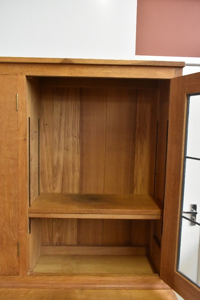 DEREK 'LIZARDMAN' SLATER; a light oak bookcase, the upper section with central panelled cupboard - Image 5 of 11