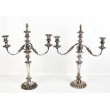 A pair of 19th century silver plated three light candelabra, each with the facility to remove the