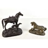 AFTER DUBUCAND; a bronze figure group of saddled horse and two greyhounds on naturalistically