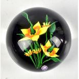 ALAN SCOTT; a trial glass paperweight with internal floral detail, signed with 'A' to cane to the