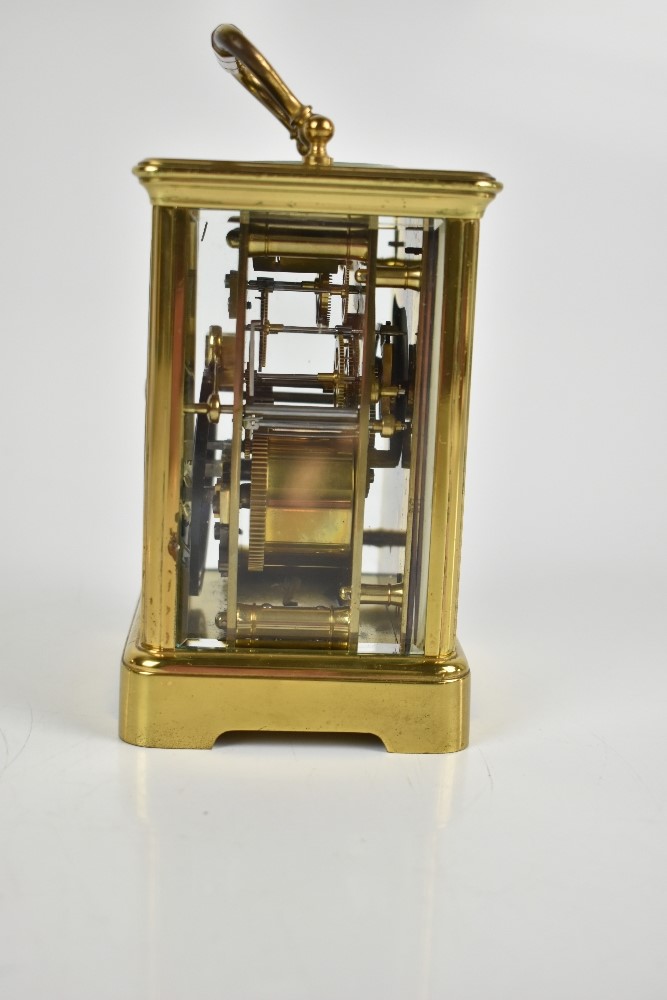 A late 19th century French brass carriage clock, the white enamel dial set with Roman numerals - Image 6 of 6