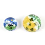 JESSE TAJ KAROLCZUK; two contemporary glass paperweights encased with turtles on a beach and seabed,