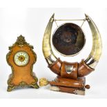 An early-mid 20th century table top dinner gong with twin horns and electroplated mounts on square