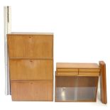 POUL CADOVIUS; a Danish teak modular nine piece wall unit comprising assorted cupboards and five