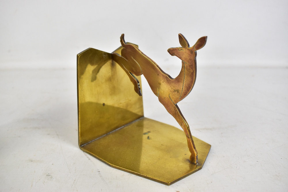 A pair of Art Deco brass bookends modelled as leaping deer, height 12cm.Additional InformationOne is - Image 2 of 4