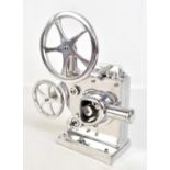 A modern polished aluminium model of a cine reel projector, height 29.5cm. Additional