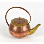 An Arts & Crafts copper and brass teapot with swing wicker handle, impressed marks WW to base,