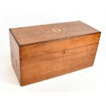 A mahogany rectangular box with inlaid detail ‘L G The Salvation Army’ and central emblem to