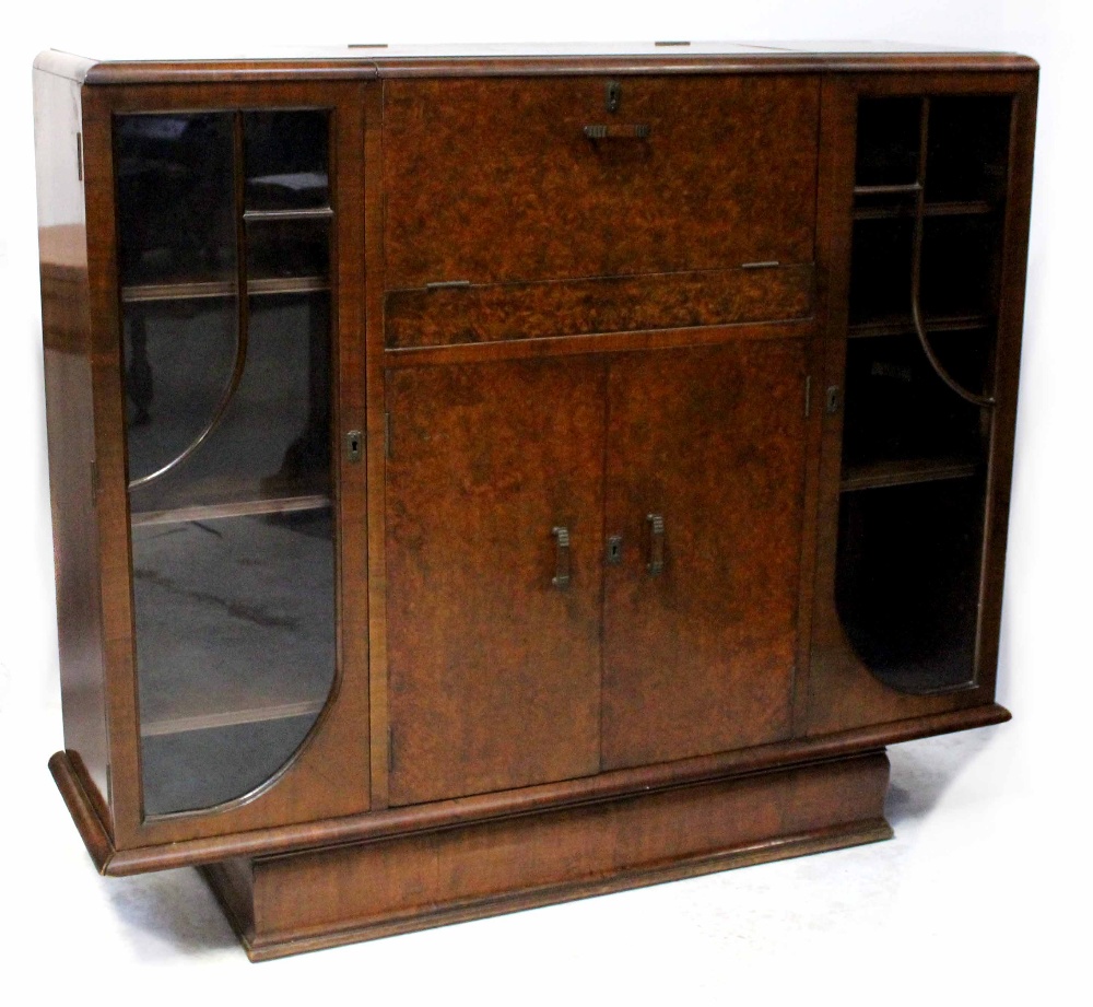 An early/mid-20th century walnut Art Deco cocktail cabinet,