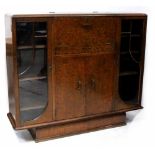 An early/mid-20th century walnut Art Deco cocktail cabinet,