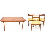 A retro Mackintosh teak extending dining table to tapering supports, to extra leaves to the centre,