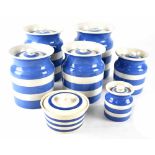 A small quantity of blue and white Cornish kitchen ware and a similar sugar bowl.