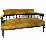 A 19th century two-seater settee with mustard-green velour upholstered backs, arms and seats,