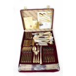 An SBS Bestecke Solingen twelve place setting canteen of gold plated cutlery,