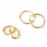 Two pairs of hallmarked 9ct gold hoop earrings, the largest pair with rope twist pattern,