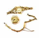 Record; a ladies' vintage 9ct gold wristwatch on 9ct gold gate bracelet,
