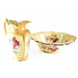 A Victorian style seven-piece floral and gilt-heightened dressing table set comprising oval tray,