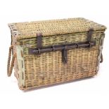 A 1930s British military wicker basket with internal tin liner,
