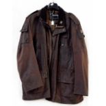 A Barbour jacket with brown corduroy collar.