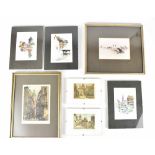 A group of watercolours and prints to include print of a German town with river flowing through,