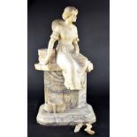 A substantial late 19th/early 20th century mixed marble figure of a woman resting on a wall with